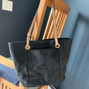 Black with nude handles Michael Kors handbag